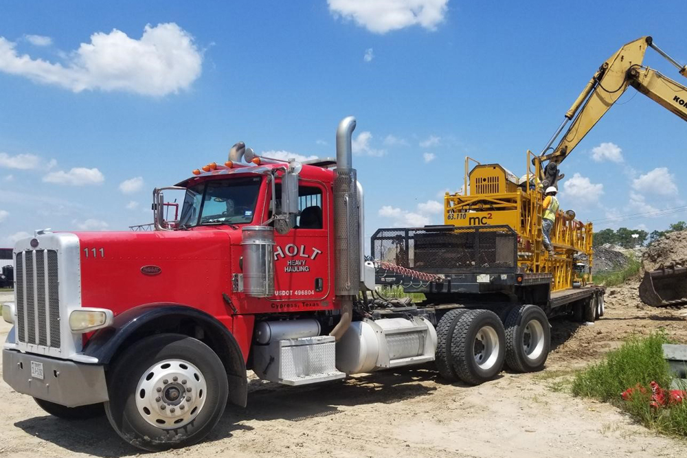 Owner-operator heavy haul truck with expert dispatch services by dispatcher direct