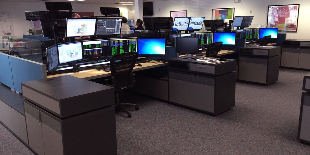 smart cargo van dispatcher dashboard showing earnings, miles, and load trends for drivers